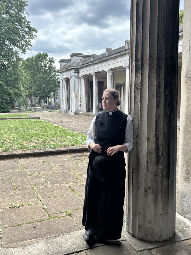A photograph of Mother Elizabeth, she is a young woman, dressed in clericals. 